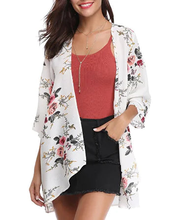 Irregular printed long-sleeved dress with V-neck and bow