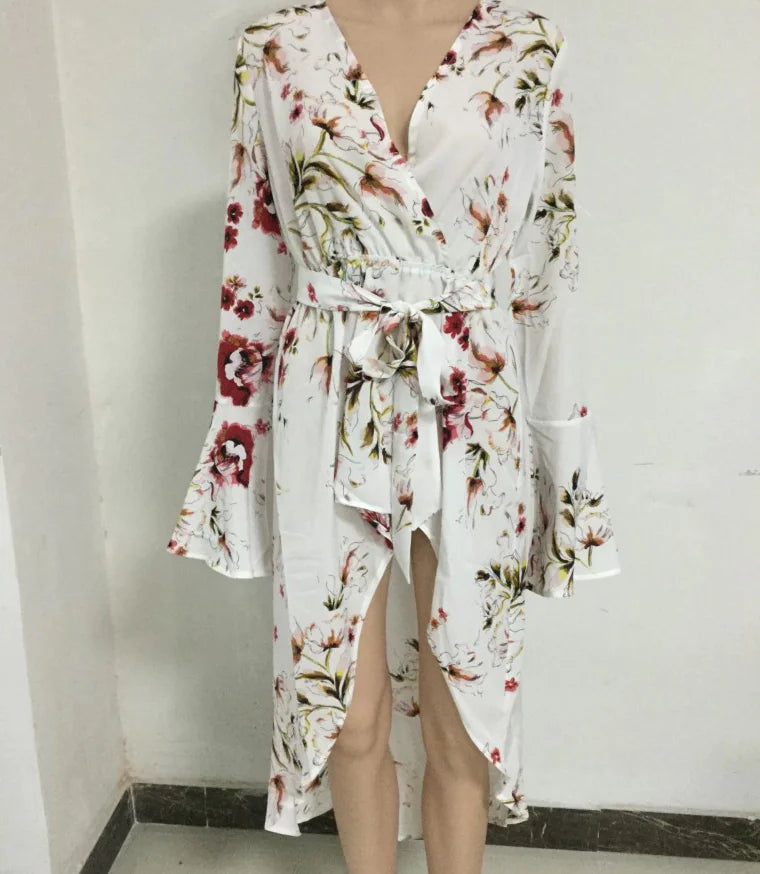 Irregular printed long-sleeved dress with V-neck and bow