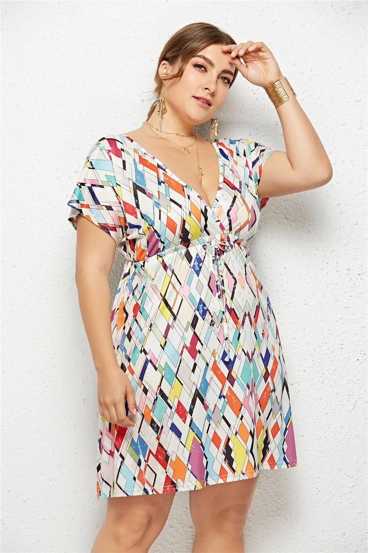 Printed dress with deep V-neck and elasticated waist