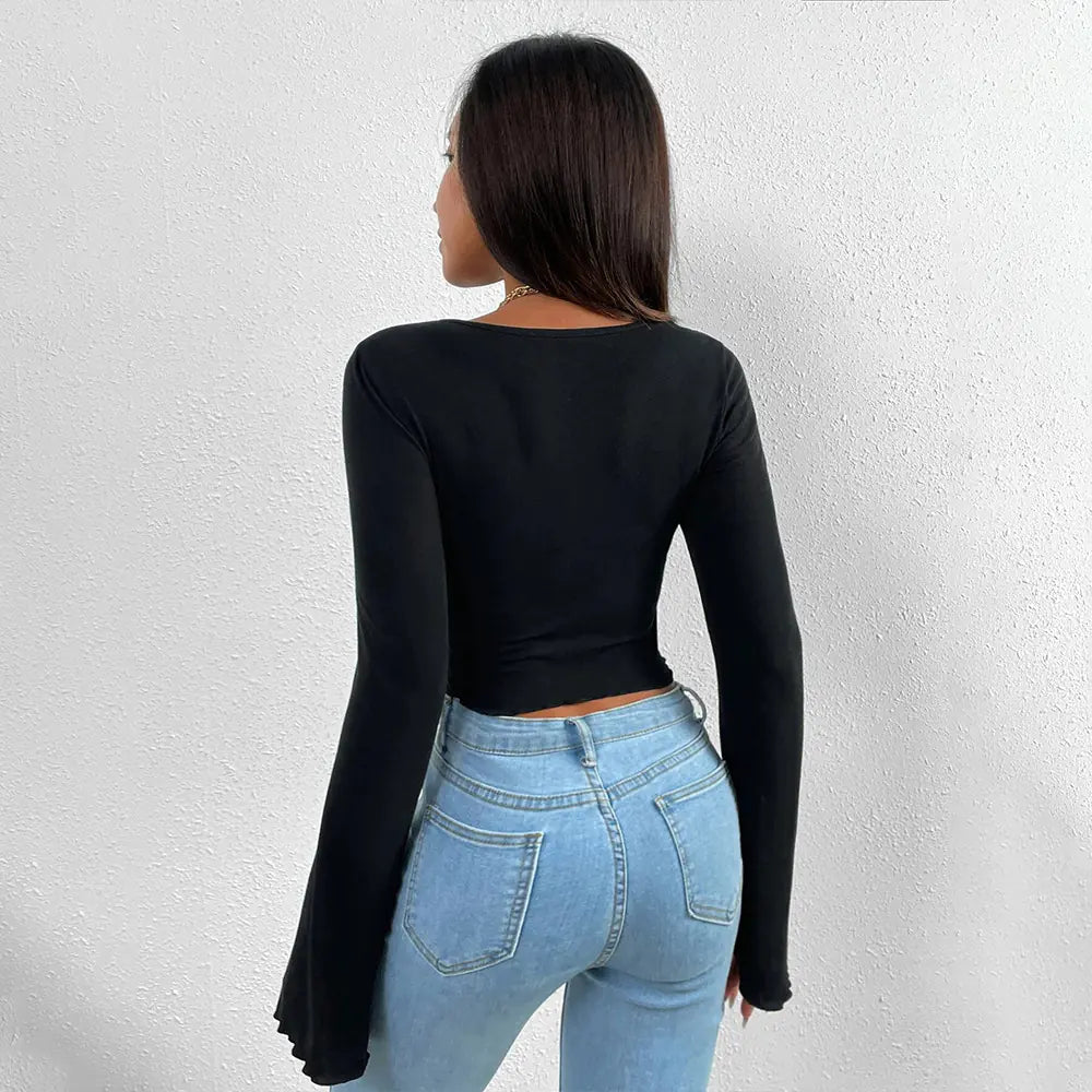 Camiseta de mujer de manga larga con cuello en V y punto irregular