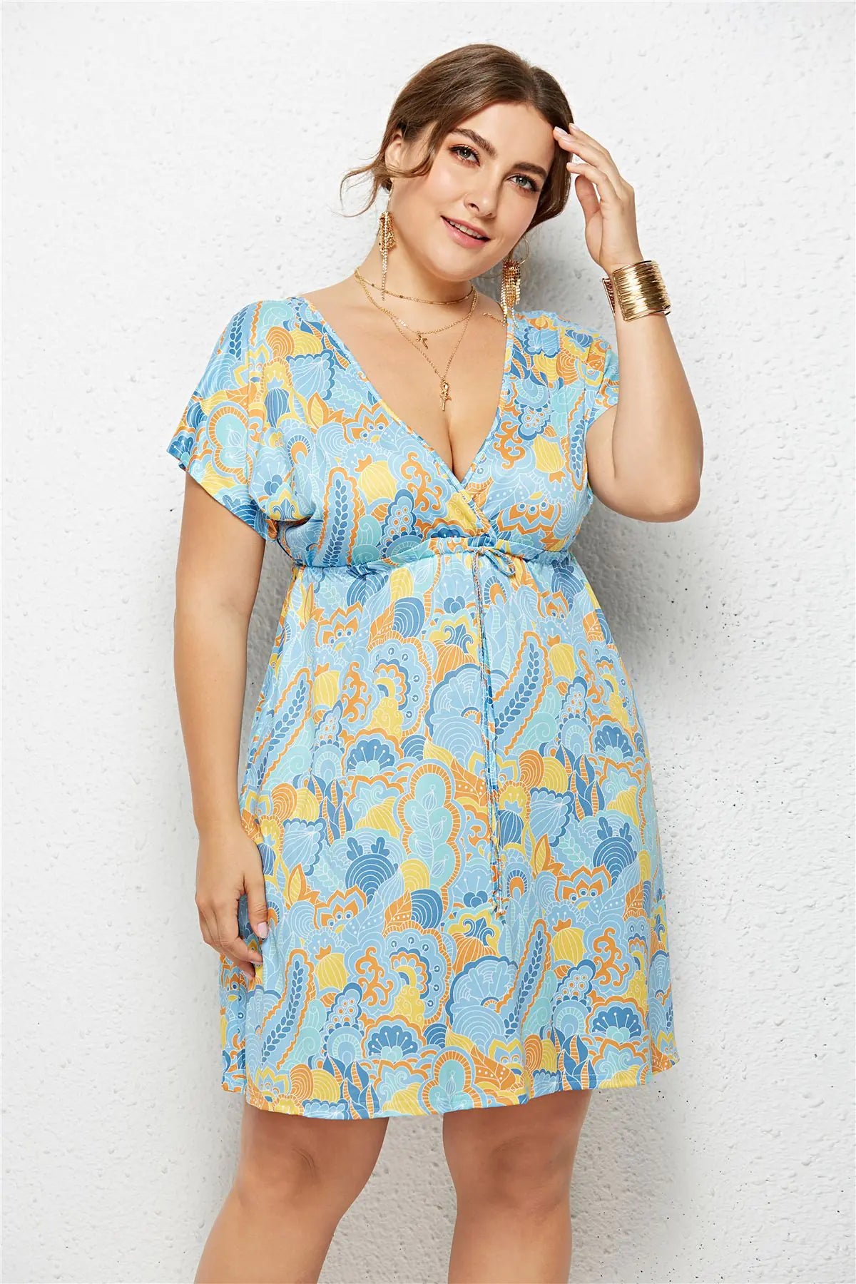 Printed dress with deep V-neck and elasticated waist