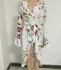 Irregular printed long-sleeved dress with V-neck and bow