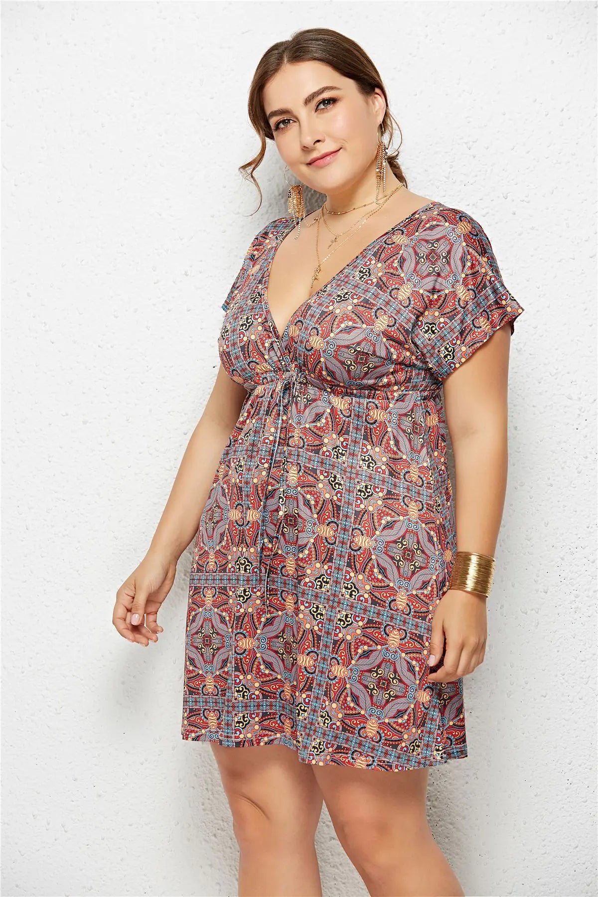 Printed dress with deep V-neck and elasticated waist