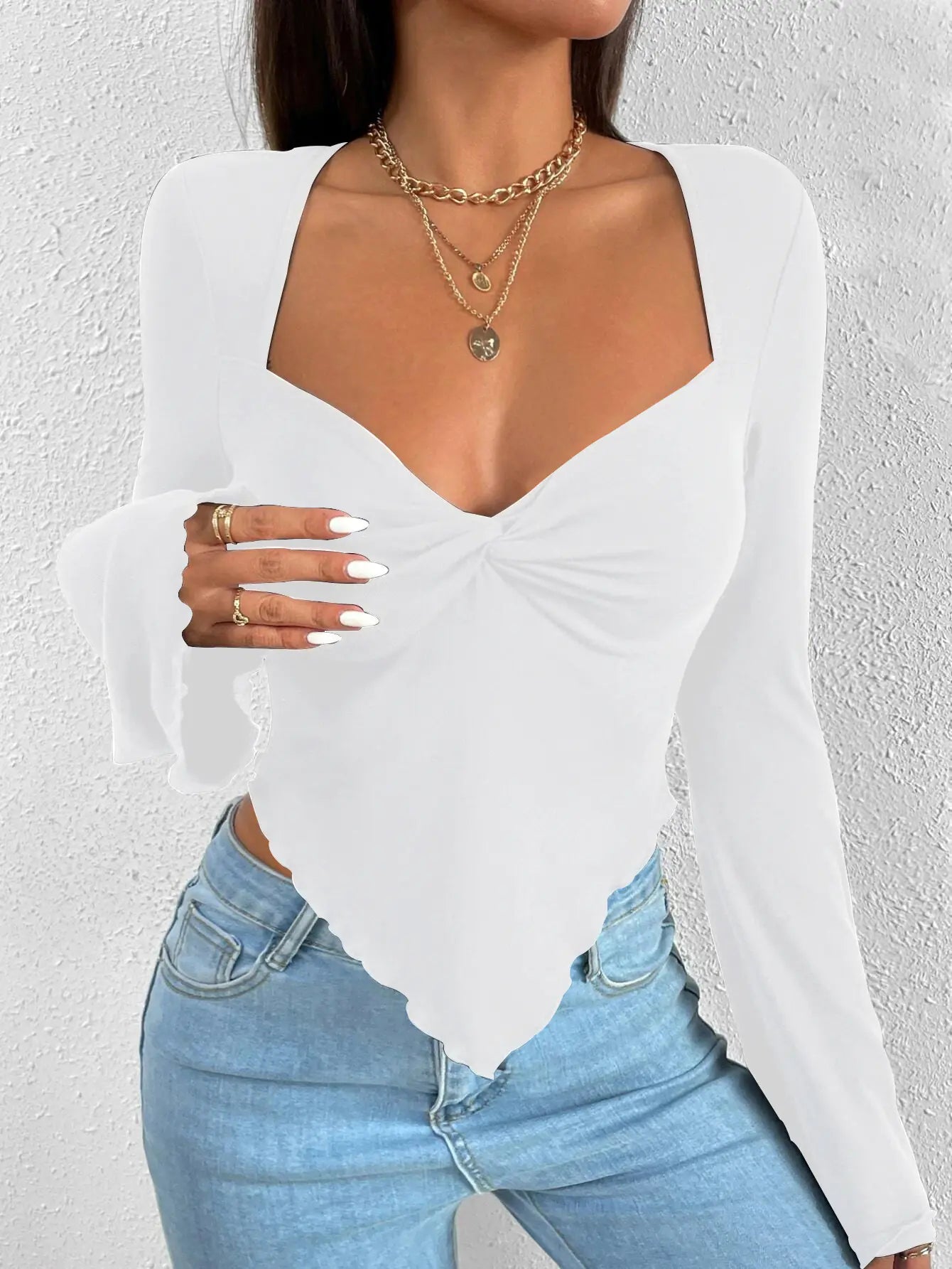 Camiseta de mujer de manga larga con cuello en V y punto irregular