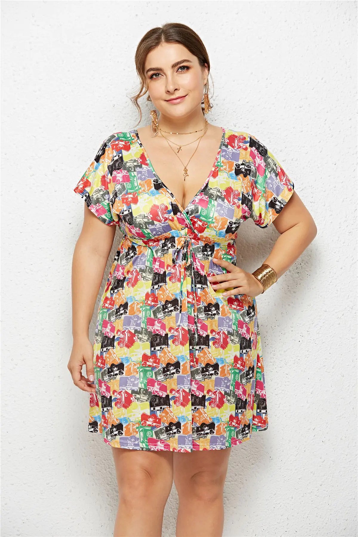 Printed dress with deep V-neck and elasticated waist